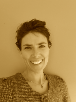 Headshot of a woman with a business jacket