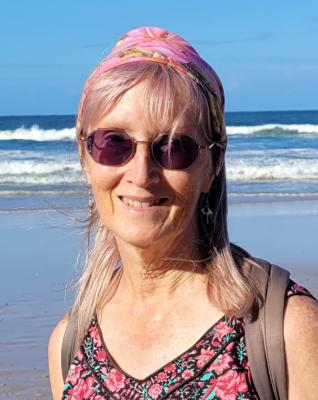 Image of woman by ocean Image of woman by ocean