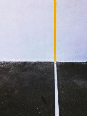 Lines meeting at walls of black and white meeting, photo taken by Jon Tyson and unsplash 