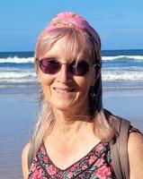Image of woman by ocean