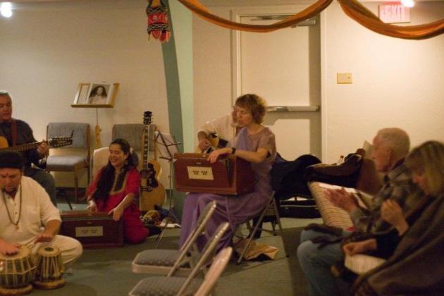 Nelle playing the harmonium