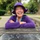 Beatrice Blake purple Shirt leaning
